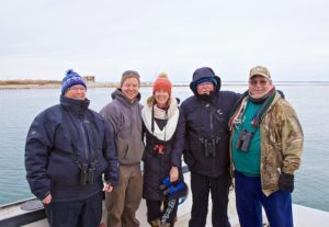 Westport CT CBC 2017 Norwalk Islands, CT. l. to r. Mardi Dickinson, Compiler; Capt Charlie Wetmore; Morgan Wetmore; Townsend Dickinson Co-Compiler; Larry Flynn. ©Mardi Welch Dickinson/KymryGroup™. All Rights Reserved