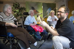 Audubon Connecticut's Ken Elkins presenting his Bird Tales program to residents of Greenwich Woods Health Care Center in Greenwich, CT. ©Bob Sacha All Rights Reserved.
