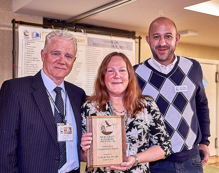 L. to R. Jack & Cindy Niciecki, Recipient of the Richard Kane Conservation Award; Eric Stiles, President, New Jersey Audubon. Cape May Fall Festival 2018, Cape May NJ. ©Mardi Welch Dickinson/KymryGroup All Rights Reserved. 