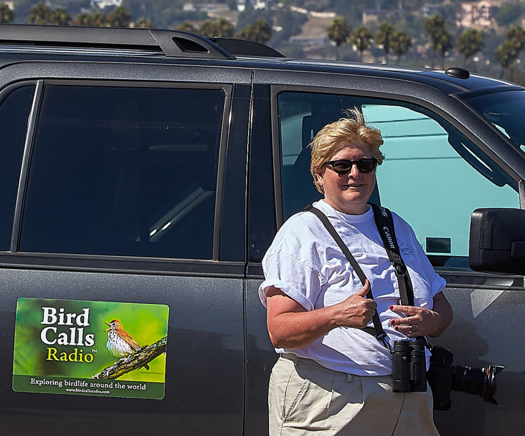 Mardi Dickinson, Host of BirdCallsRadio on location at Stearn's Wharf, Santa Barbara, CA ©Townsend Dickinson. All Rights Reserved.
